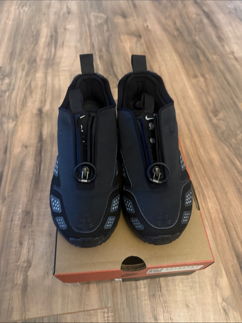 Nike Women’s Black and Navy Slip-On Zippered Sneakers